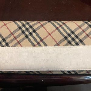 Burberry long wallet in not the best condition.